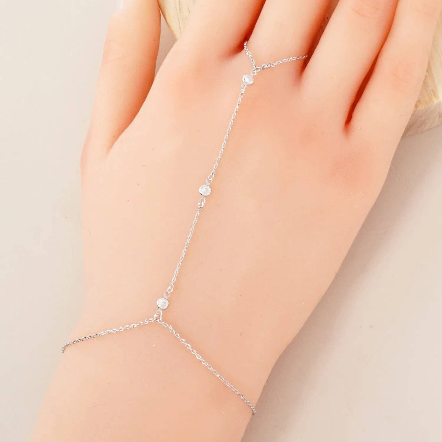 Three Round CZ Accent 18K-Gold-Dipped Delicate Brass Hand-Chain Bracelet: Rhodium