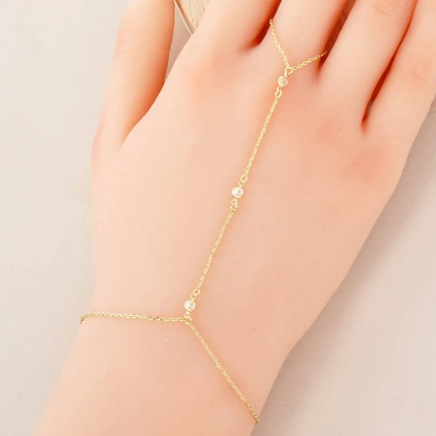 Three Round CZ Accent 18K-Gold-Dipped Delicate Brass Hand-Chain Bracelet: Rhodium